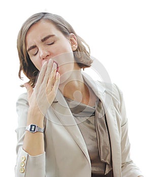 Businesswoman in white suit so Bored and yawning at office computer desk in workplace