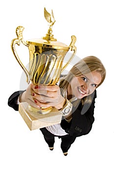 Businesswoman winning a gold trophy