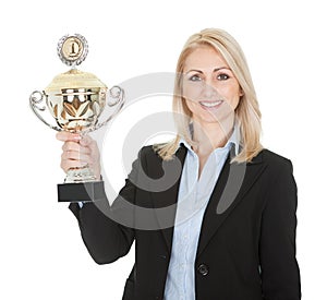 Businesswoman winning a trophy