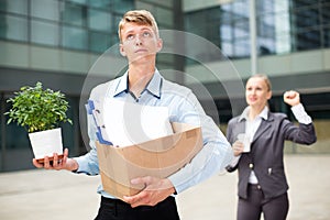 Businesswoman is wishing good luck to worker