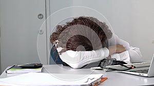 Businesswoman or Woman staff sleep in front of computer. Fatigue from work concept.