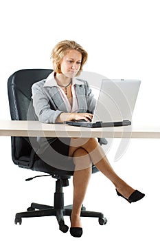 Businesswoman working behind desk