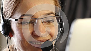 Businesswoman working in a call center. customer service proffessional talking on headset. 4K