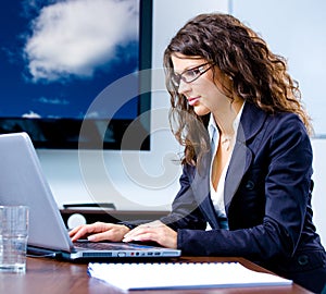 Businesswoman working on computer