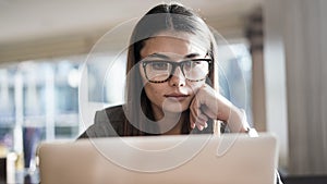 Businesswoman working in computer in office