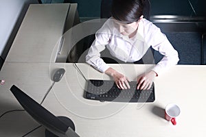 Businesswoman working with computer in office