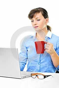 Businesswoman is working with a cup of coffee