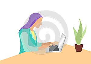 Businesswoman working on desk with laptop over white background