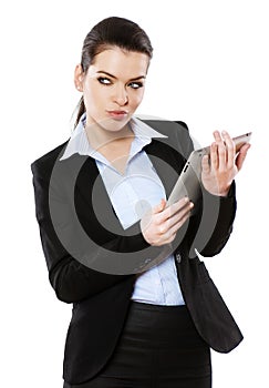 Businesswoman working on digital tablet