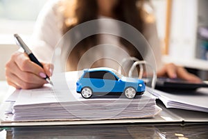 Close-up Of A Small Blue Car