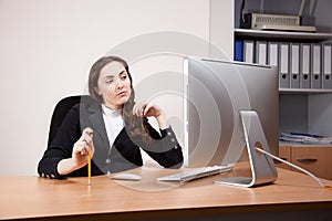 Businesswoman working on her computer