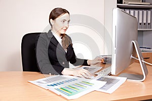 Businesswoman working on her computer