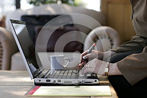 Businesswoman Working on a Laptop Computer