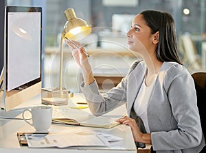 Businesswoman, working late and computer in office as copywriting in agency on deadline for employer. Female person