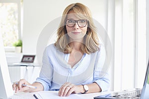 Businesswoman working at modern office