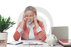 Businesswoman working at office desk is having an headache