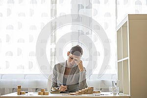 Businesswoman working at office desk