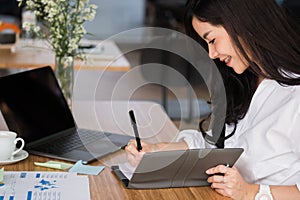 Businesswoman write note on notebook at workplace. startup woman