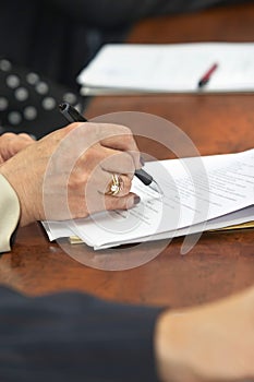 Businesswoman writing