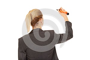 Businesswoman writing with pen.