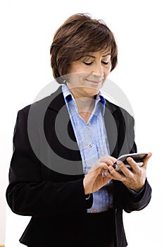 Businesswoman writing text message