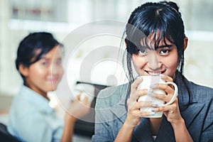 Businesswomen on the coffee break in office