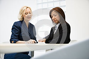 Businesswomen communicating photo