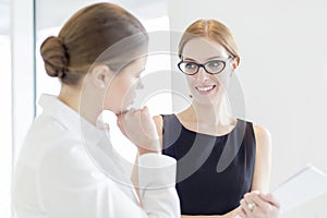 Businesswomen discussing in office