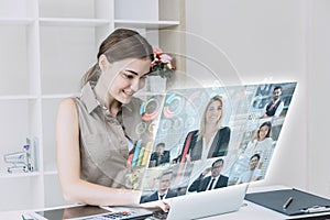 Businesswomen happy using high technology online meeting via internet with futuristic digital device to video calling with