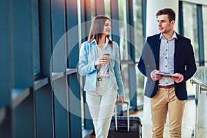 Businesswomen hold luggage travel to business trip