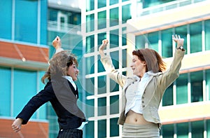 Businesswomen Jump For Joy