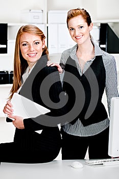 Businesswomen with Laptop and Computer