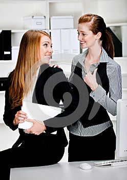 Businesswomen with Laptop and Computer