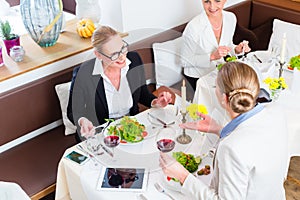 Businesswomen meeting at business dinner