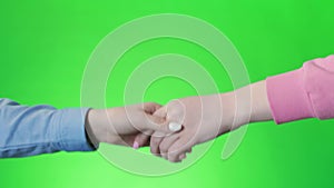 Businesswomen shaking hands after deal, keyed green screen