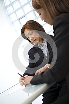 Businesswomen at table