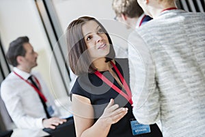 Businesswomen talking during coffee break at convention center