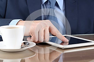 Busineswoman working with a digital table in the office