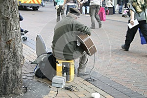 Busker with Electric Guitar photo