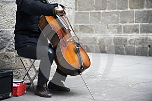 Busker playing the cello photo