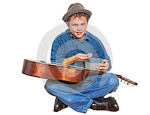 Busker playing guitar isolated