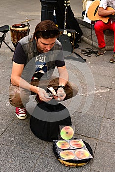 The busker (street musician) with money