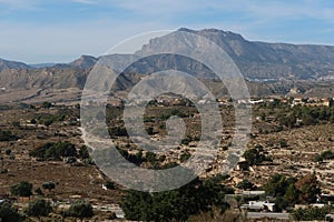 Penya Mitjorn mountain seen from Busot, Alicante, Spain photo