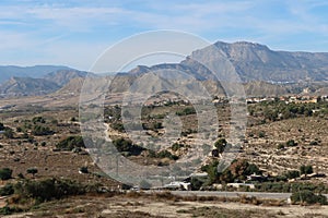 View of Penya Mitjorn mountain from Busot, Alicante, Spain photo