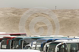 Busses in the desert.