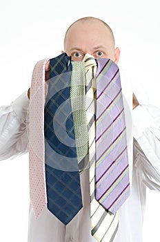 Bussines man choosing ties