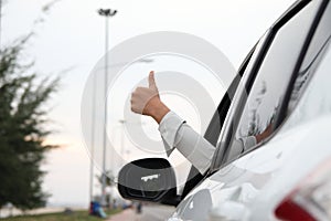 Bussiness hand women with the thumbs up sign photo