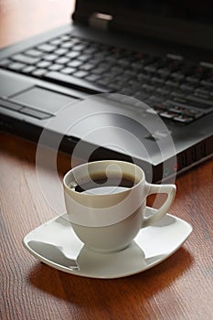 Bussiness theme with laptop and coffee photo