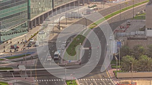 Bussy traffic on the road intersection in Dubai business bay district aerial timelapse, UAE