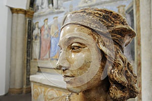 Bust of Raffaello Sanzio, known as Raphael. On the background there is a fresco painted by Raffaello Sanzio. Chapel of San Severo